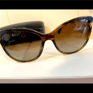 CHANEL POLARIZED SUNGLASSES slight cat eye shape.